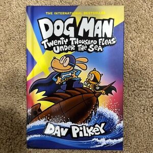 Dog Man- Twenty thousand fleas under the sea by Dave Pilkey. Book 11